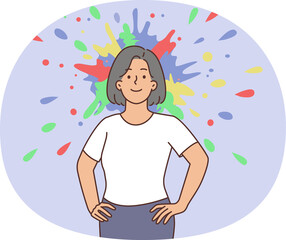 Confident woman with splash behind head engaged in creative thinking. Smiling female feel optimistic enjoy creative process.