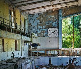 The interior of some abandoned buildings destroyed by time, in the exclusion zone of the city of...