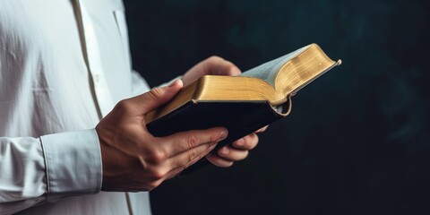 Man Hand Holding Bible