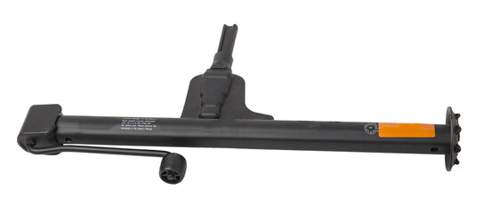 Fototapeta premium Black metal jack for replacing a car wheel on a white isolated background in a car service. Equipment in the trunk and in the garage.