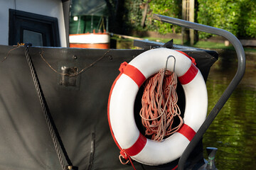 life buoy on the back of a motor boat