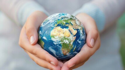 Hands cradling a vibrant Earth globe, symbolizing environmental care