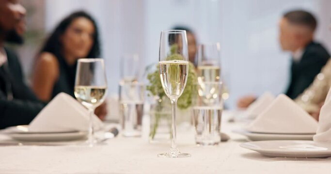 Champagne, dinner and people with party glass at special event, friends reunion or fine dining restaurant. Conversation, beverage and elegant group with classy drinks, alcohol or sparkling white wine