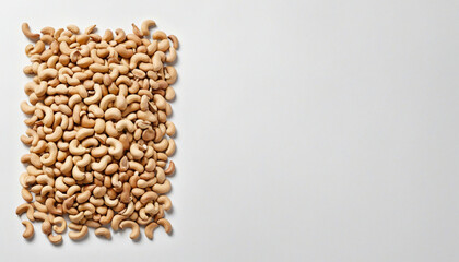 Obraz premium A Left Border From Above Of Roasted Cashew Nuts Isolated Against A Transparent Background. PNG. Party Food Snacks. For Aperitif or Party