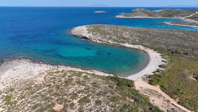 Aerial drone photo of paradise secluded beaches in Southern part of Antiparos island with crystal clear sea, Cyclades, Greece