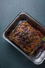 Delivery of meat dishes. Close-ups