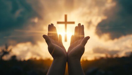 Silhouette of hands presenting Christian cross against sunset - obrazy, fototapety, plakaty