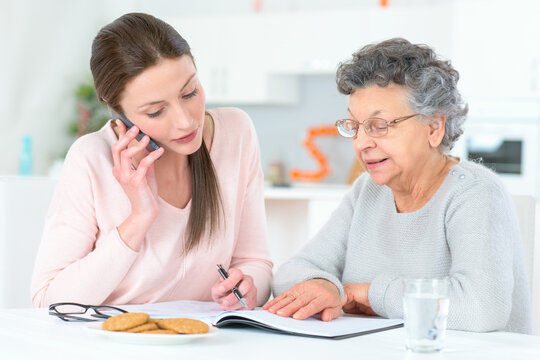 a female caregiver with senior