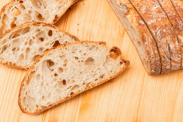 bread slices on a wooden table as a background, simple image
