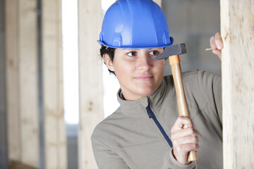 female carpenter at construction site