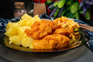 Pieces of chicken fried in breadcrumbs.