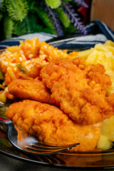 Pieces of chicken fried in breadcrumbs.