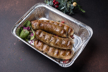 Delivery of delicious sausages. Close up