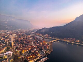 Aerial view of the beginning of the Adda River and the bridges of Lecco, Italy.