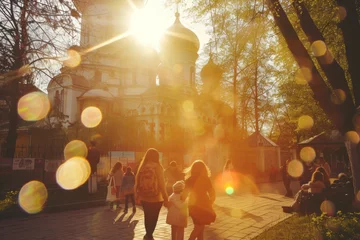 Deurstickers kyiv, ukrainians celebrate orthodox easter near church in may , lens flare, yellow and golden © Наталья Добровольска