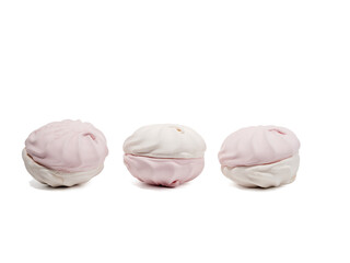 White and pink meringue cookies on a transparent PNG background. Meringue cookies close-up.