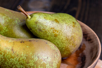 Ripe green pears on the table
