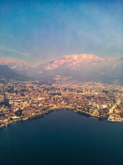 Fototapeta premium Aerial shot of the city of Lecco at dusk