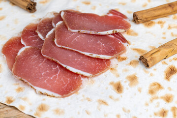 delicious dried meat and traditional oriental thin pita bread