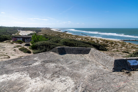 Panoramic view of coastline towards Soulac-sur-Mer, France, with in the forefront some of the remains of the bunkers and fortifications Batterie c&ocirc;ti&egrave;re des Arros of the Atlantic Wall from WW2