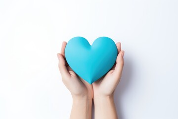 Fototapeta premium hands holding blue heart, healthcare, love, organ donation, family insurance, World Heart Day, World Health Day, World Mental Health Day, Valentine's Day