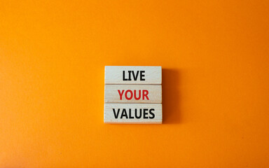 Live your values symbol. Concept words Live your values on wooden blocks. Beautiful orange...