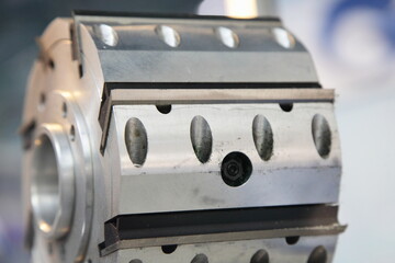 Jointer surface planer milling cutter tool blades on rotor adapter closeup - instrument for machine...