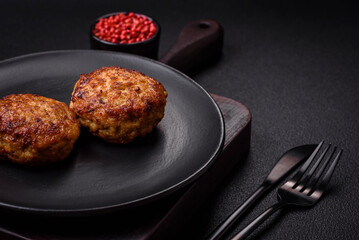 Delicious fresh fried minced fish cutlets with spices and herbs