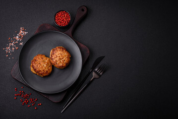 Delicious fresh fried minced fish cutlets with spices and herbs