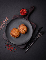 Delicious fresh fried minced fish cutlets with spices and herbs