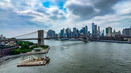 New York, USA; The Brooklyn Bridge over the East River linking the world famous boroughs of Manhattan and Brooklyn.
