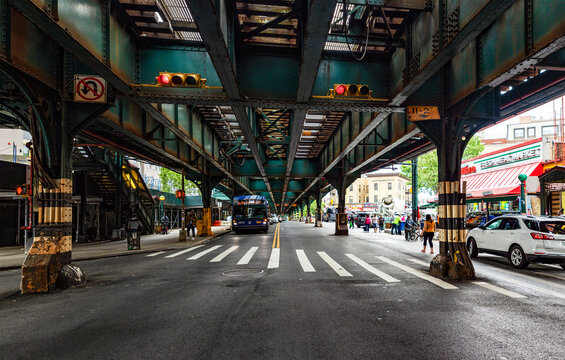 New York, USA; January 3, 2024: One of the sections of the Grand Concourse Avenue in the Bronx borough, with subway rails in the air.