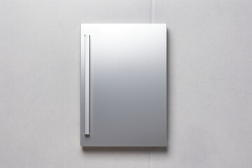 A mirror mounted to the side of a wall. Perfect for adding functionality and style to any space
