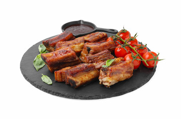 Tasty roasted pork ribs, basil, sauce and tomatoes isolated on white