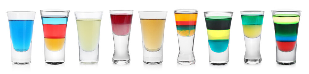 Different shooters in shot glasses isolated on white, set