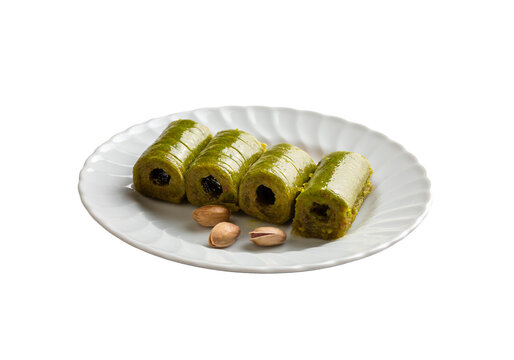 Pistachio baklava. Traditional Middle Eastern Flavors. The local name of Baklava is Fıstıklı Baklava or fıstıklı dolama. Turkish style pistachio baklava presentation and service