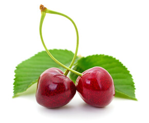 Sweet cherries with stem and leaves. - 725070351