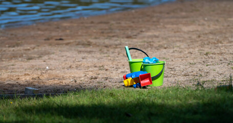 Sand toys on a beach.