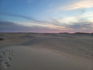 Fototapeta na wymiar sand dunes. Picture Of A Desert Landscape