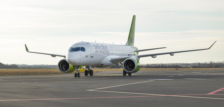 PRAGUE - December 27, 2023: Air Baltic Airbus A220-300 REG:YL-ABL at Vaclav Havel Airport Prague. From Riga to Prague. Air Baltic, legally incorporated as AS Air Baltic Corporation, is the flag carrie