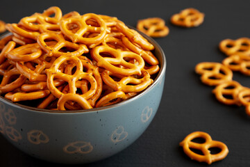 Mini Pretzels with Salt in a Bowl, side view.