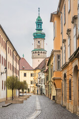 Fototapeta na wymiar Firewatch Tower with historic street in Sopron, Hungary, Europe.