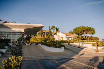 Sotogrante, Spain - January 25, 2024 - Modern resort architecture with terraced gardens under a...