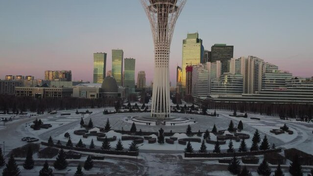 Drone flight above Astana city center with skyscrapers and Baiterek Tower. Capital of Kazakhstan, Qazaqstan.