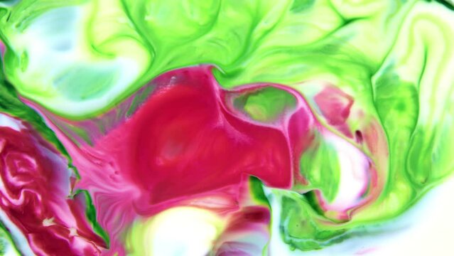 This stock video features a slow motion footage of oil paint motion, where Paint pigment are separated by light paint. Use this clip as background for creative concept videos, presentations, and more.