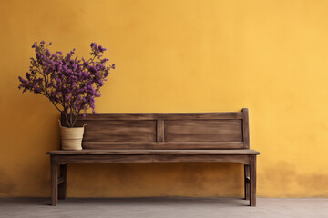 Rustic wood bench against yellow stucco wall with copy space