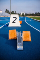 track starting block Numbers 2 on Race track, relay running competition