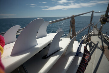 Surfboards on a rack on a boat
