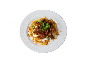 Turkish food; Cokertme Kebab - Beef meat kebab with yoghurt and french fries