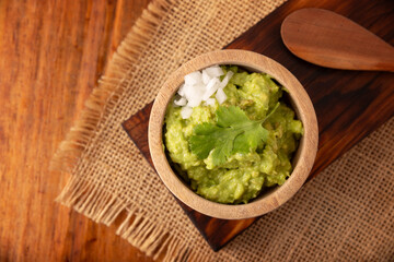 Guacamole. Avocado dip sauce, one of its many ways of consuming it is spread on tortilla chips also called Nachos. Mexican easy homemade sauce recipe very popular.